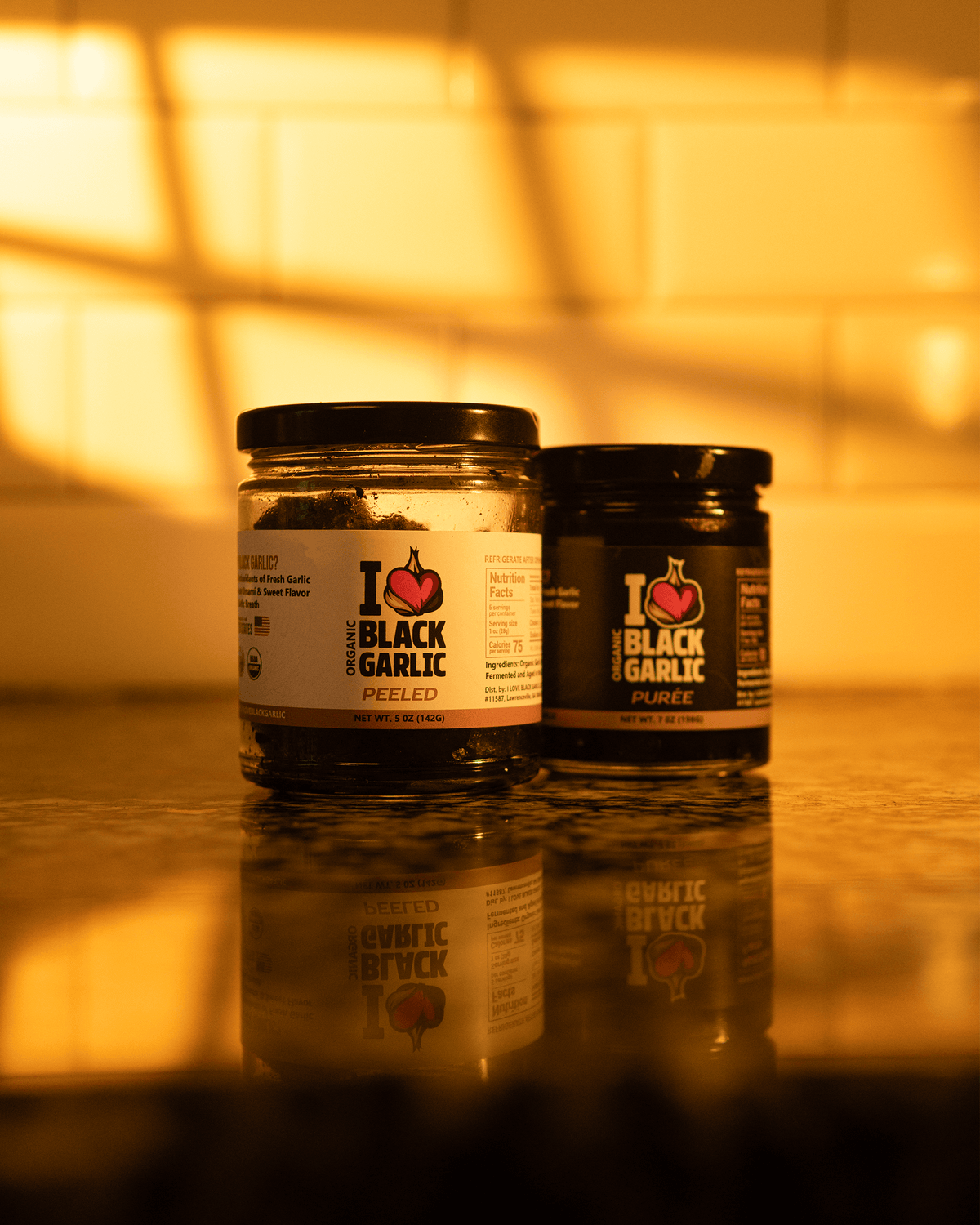 Best Black Garlic For Cooking, Flavor, Snacking And Everyday Use jars on a kitchen counter