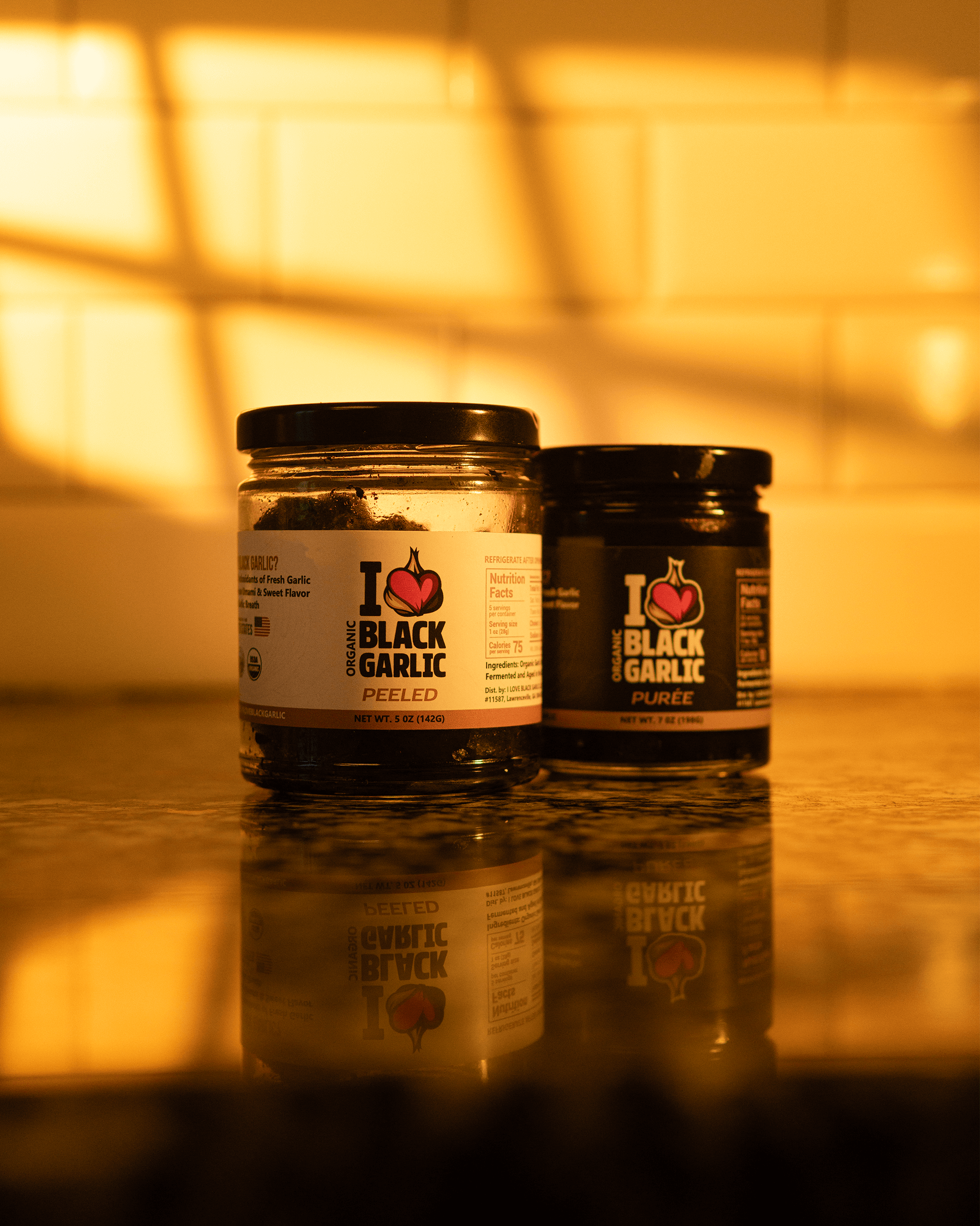 Best Black Garlic For Cooking, Flavor, Snacking And Everyday Use jars on a kitchen counter