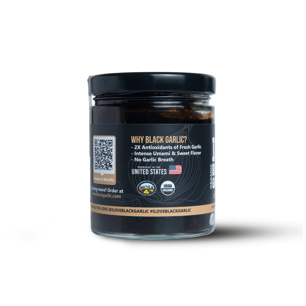 Black Garlic Purée 7 oz | Bold Umami Flavor | Vegan jar showcasing organic black garlic benefits and certifications.