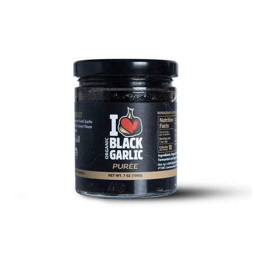 Black Garlic Purée 7 oz | Bold Umami Flavor | Vegan jar with label showing organic black garlic nutrient details.