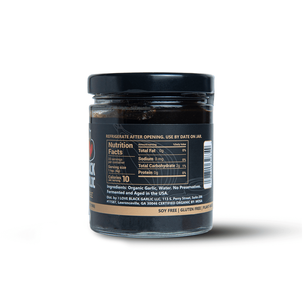 Black Garlic Purée 7 oz | Bold Umami Flavor | Vegan jar with nutrition facts on the label.